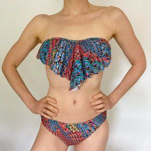 PilyQ Eyelet Bandeau Laser Cut Bikini in Blue, Green, and Red Strapless Swimsuit